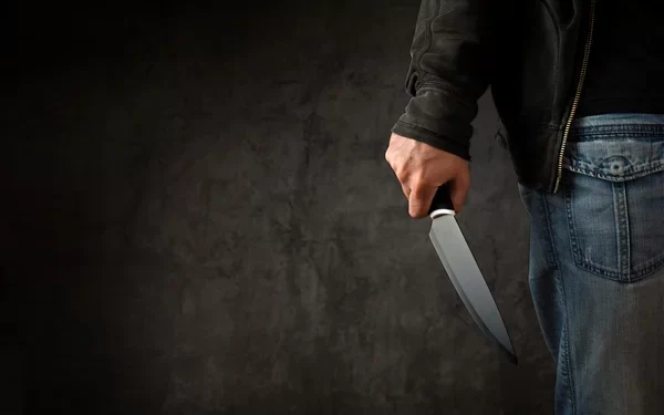 depositphotos 66397547 stock photo criminal with large sharp knife 600x375 1
